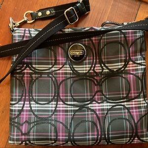 Coach cross body bag with logo design